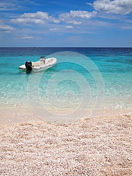 Private beach with speedboat