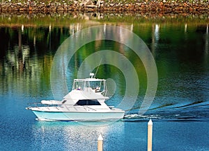 Private Boat Sailing Back Into Harbour