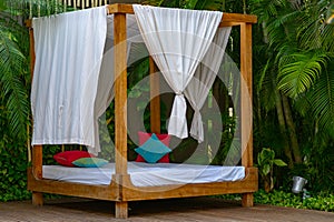 Private cabana bed by the pool