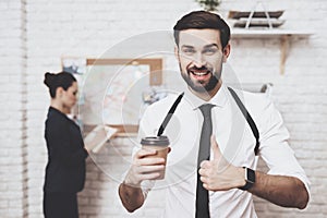 Private detective agency. Man is posing with coffee, woman is looking at clues map.