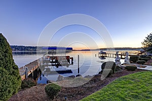 Private dock with jet ski lifts and covered boat lift, Lake Washington.