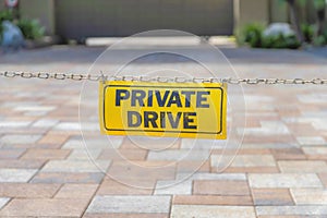 Private drive signage hanging on a chain link at La Jolla, San Diego, California