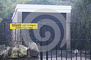 Private entrance garage house keep clear sign