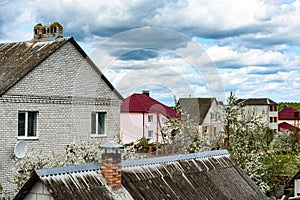 Private houses in Belarusian village. View from balcony.