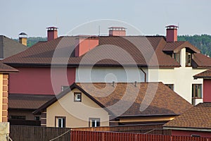 Private houses with brown tiled roofs