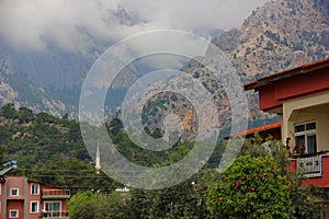 Private houses located at the foot of the mountains