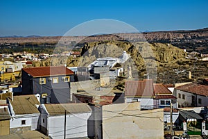 private houses between not high mountains.