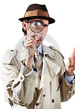 Private investigator, magnifying glass and portrait of man in studio for detective, searching and looking. Spy