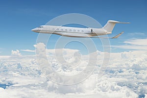 Private jet flying on the sky