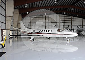 Private jet in hangar photo