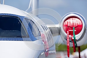 Private jet plane on the airfield.