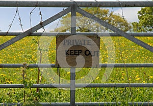 Private Keep Out sign on gate