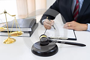 The private office of Asian young lawyer working on desktop  with legal case document in workplace for consultant. Legal law,