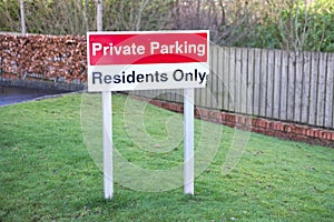 Private parking residents only sign and flats tower block