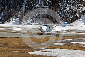 A private plane taking off in the airport of St Moritz Switzerland