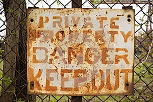 Private Property Danger Keep Out Sign Rusted Fence