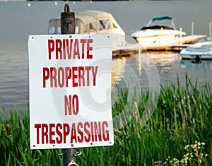 Private Property No Trespassing Sign at Lake