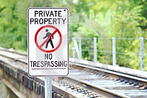 Private Property, No Tresspassing Sign at Railroad Tracks