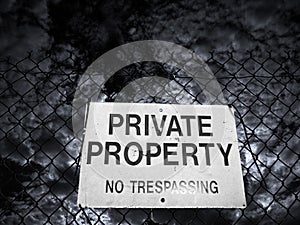 Private property sign on a fence
