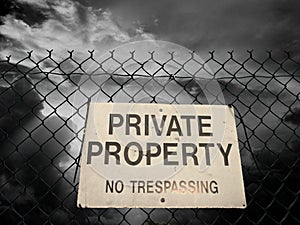 Private property sign on a fence