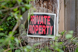 Private property sign on post