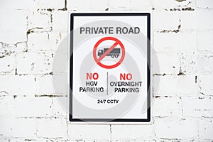 Private road sign no overnight parking and no HGV vehicles