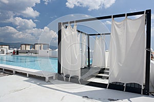 Private tent beside pool