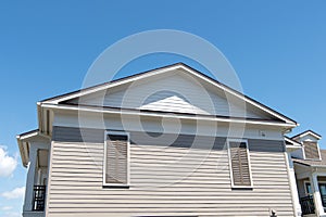 Private territory. house on blue sunny sky. moving to new house. side view of house building. Architecture structure