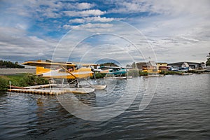 Private water airplanes parked in water airport on the lake in Alaska, Anchorage.