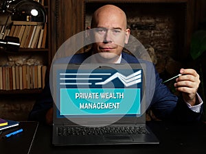 PRIVATE WEALTH MANAGEMENT text in search line. Marketing expert looking for something at computer. PRIVATE WEALTH MANAGEMENT