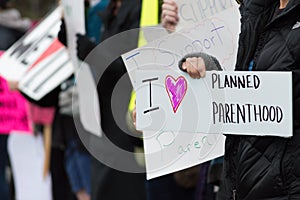Pro-choice Planned Parenthood demonstration group with signs