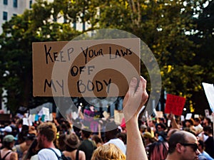Pro-choice protester holding a sign opposed to the overturning of Roe v Wade in New Orleans, USA