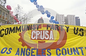 Pro-communist marchers holding banner