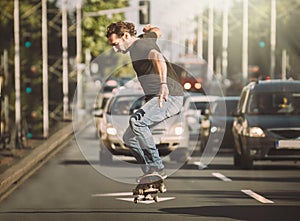 Pro skater doing tricks and jumps on street. Free ride