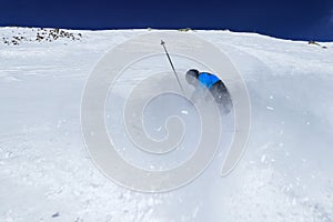 Pro skie fall on the ski slope. Severe ski accident in Chopok, Low Tatras, Slovakia. Young boy not handle a sharp curve and crash