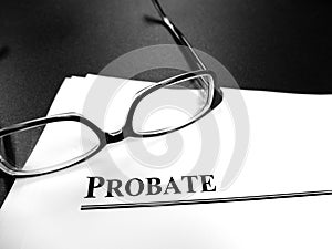 Probate Last Will and Testament Documents on Desk with Glasses