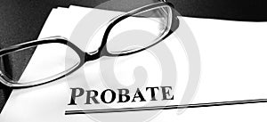 Probate Last Will and Testament Documents on Desk with Glasses