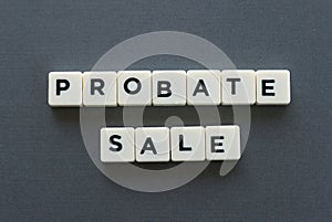 Probate sale word made of square letter word on grey background.