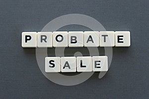 Probate sale word made of square letter word on grey background. photo