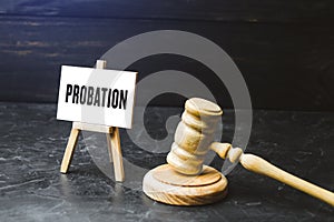 Probation and judge`s gavel. Consideration of an application for early release from imprisonment. Protection of workers rights. photo