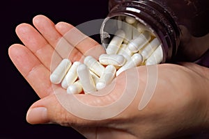 Probiotics Capsule On Palm photo