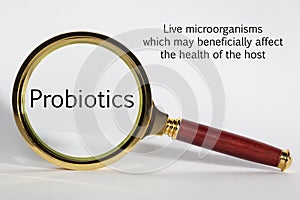 Probiotics Concept and Magnifying Glass