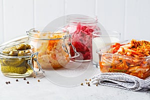 Probiotics food concept. Kimchi, beet sauerkraut, sauerkraut, kefir and pickled cucumbers