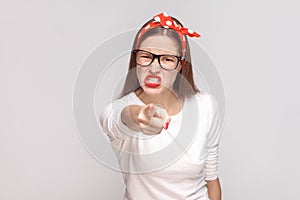 problem beause you are. anger pointing bossy portrait of beautiful emotional young woman in white t-shirt with