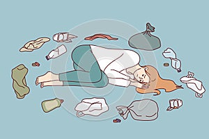 Problem environmental pollution with plastic waste worries woman ecologist lying among rubbish