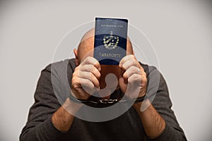 The problem of illegal immigration of refugees from Cuba, a Cuban immigrant in handcuffs. Illegal border crossing, border trespass