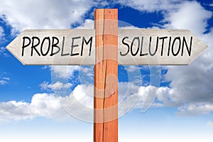Problem or solution - wooden signpost