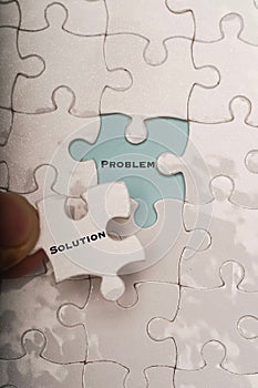 Problem and solution wordings on puzzle pieces
