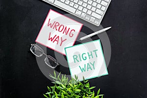 Problem solving. Right and wrong way icons on work desk from above