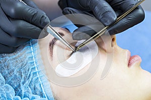 Procedure for eyelash extensions, eyelashes lamination.